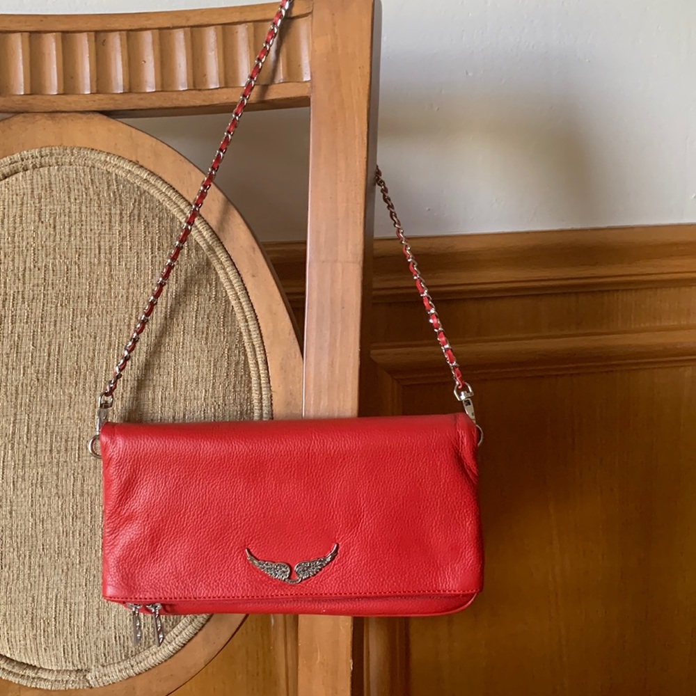 Zadig & Voltaire red leather converts in to clutch or crossbody bag .